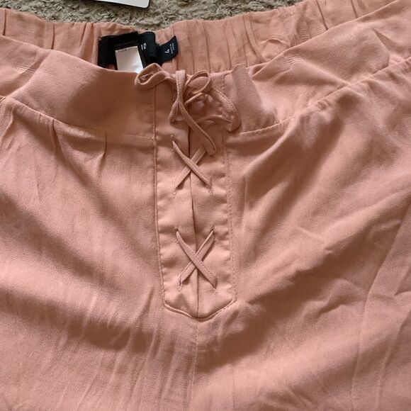 Torrid | pink crepe lace front shorts - Picture 5 of 5